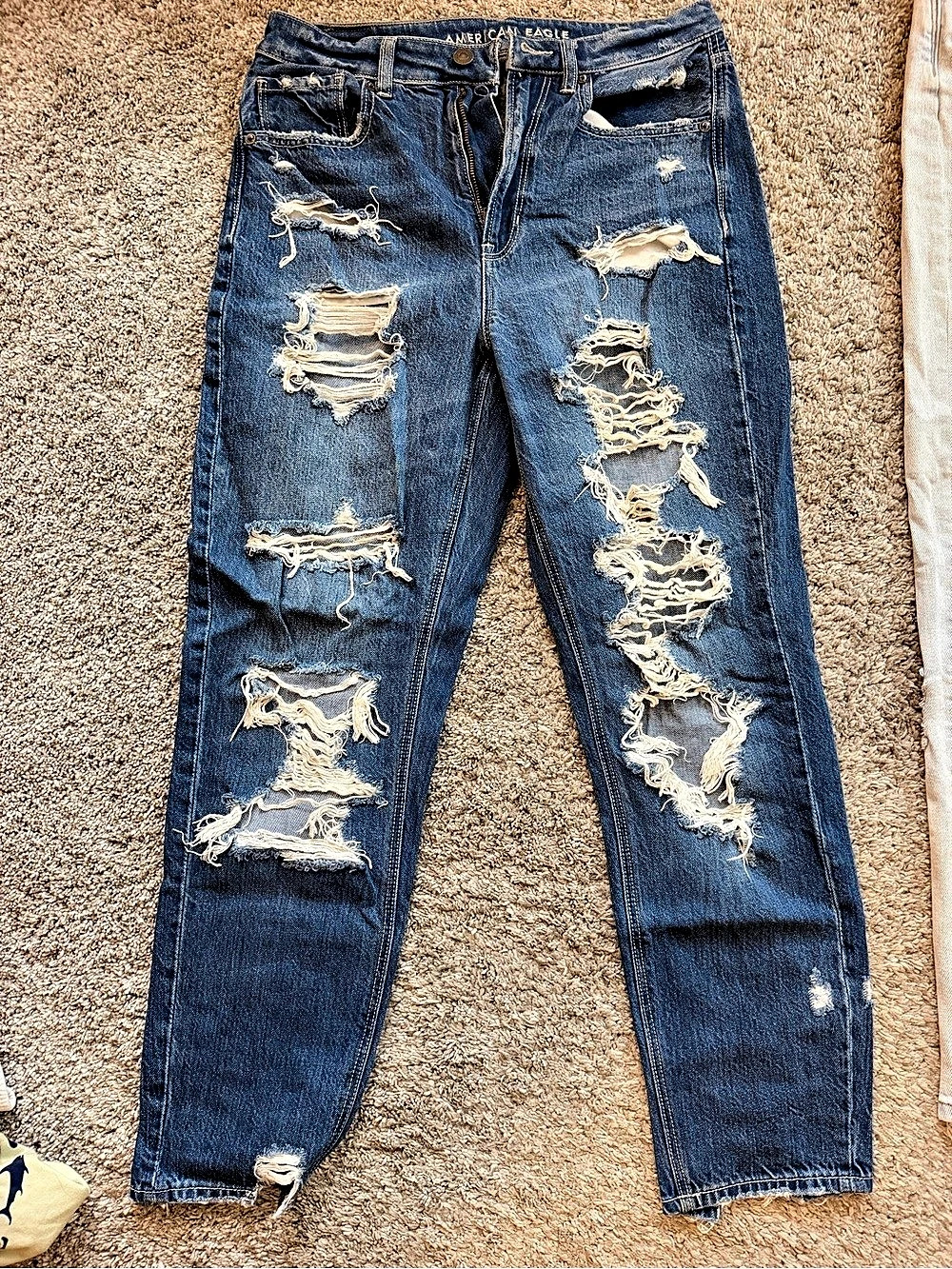 Distressed Blue Jeans